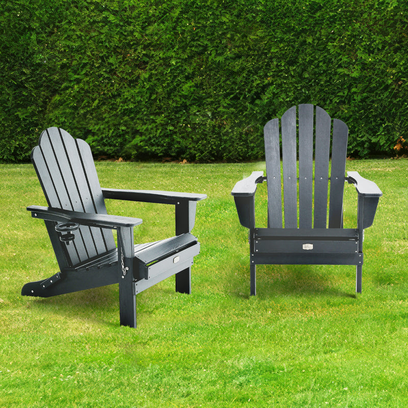 Lifestyle image of Adirondack Outdoor Chair with Cup Holder in Black outdoors
