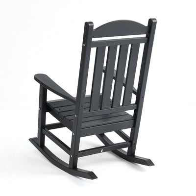 Adirondack Outdoor Rocking Chair in Black placed in garden
