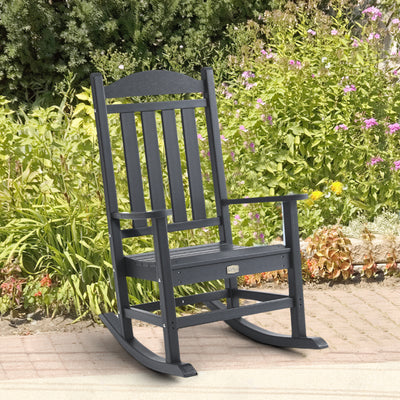 Lifestyle image of Adirondack Outdoor Rocking Chair in Black outdoors
