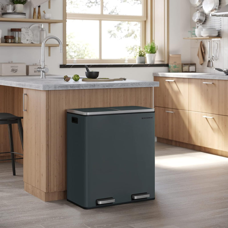 Dual 60L Rubbish Bin in Smoky Grey placed in a modern kitchen setting.
