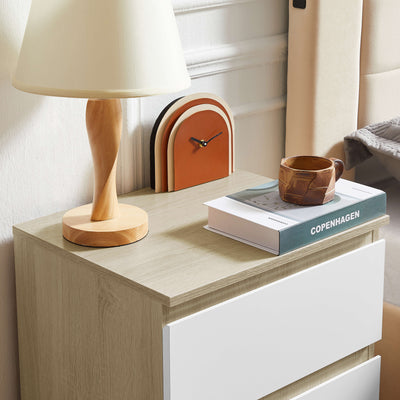 Detail of hardware on Nola Bedside Table in white and brown