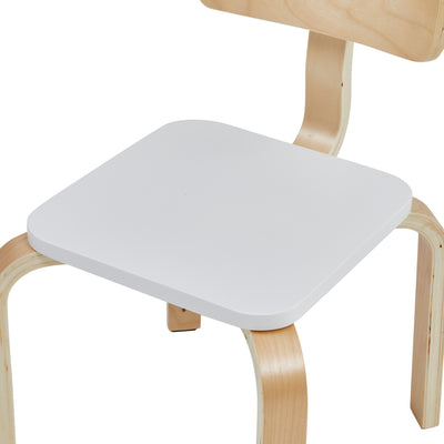 Close-up detail of white Scandinavian kids table and chairs set