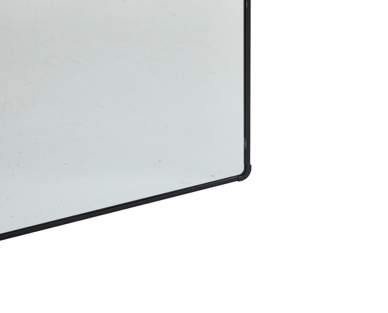 Close-up of the frame of the Selena Metal Arched Wall Mirror in black.