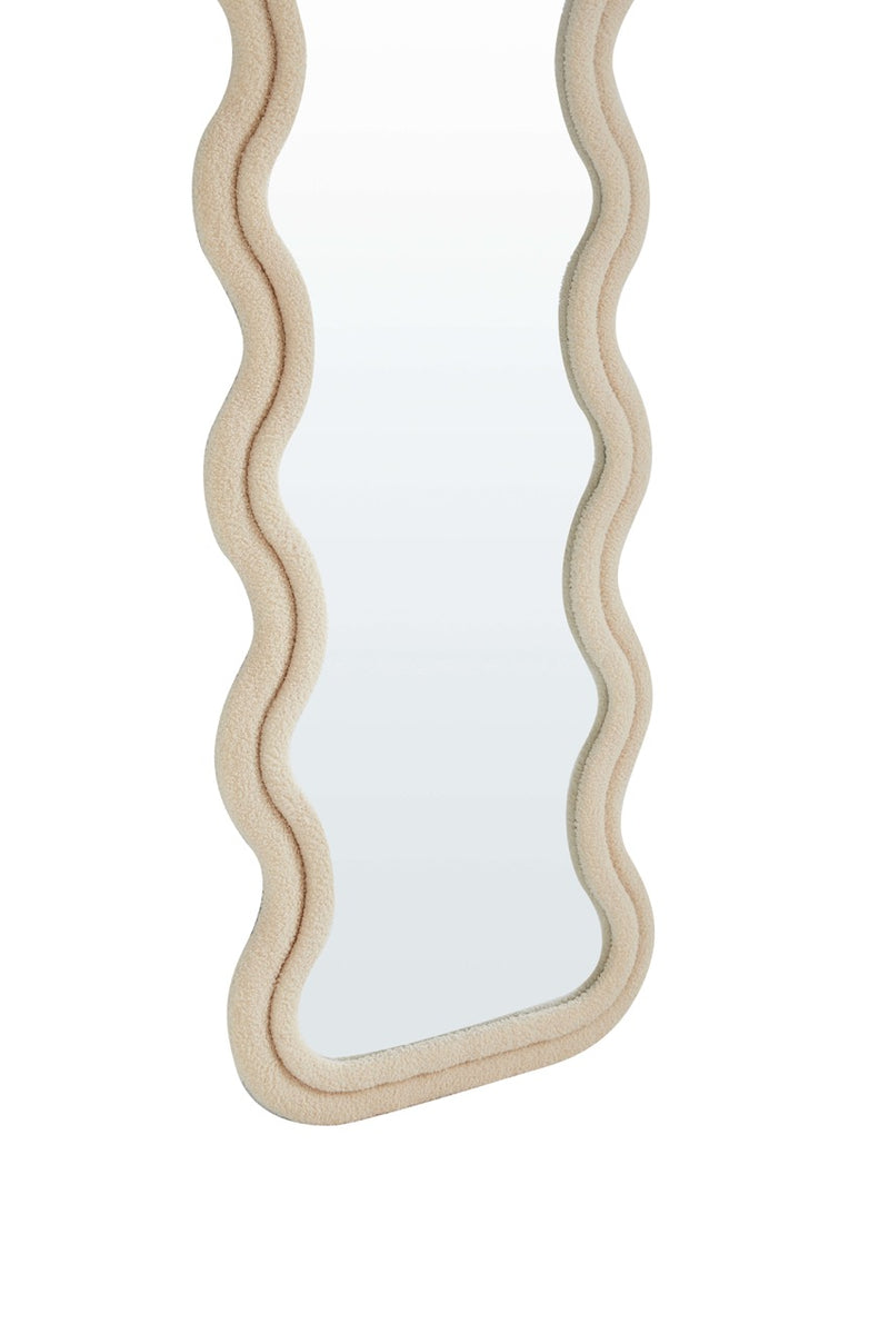 Sofie Wavy Full Length Dressing Mirror in cream color placed in a stylish room setting.