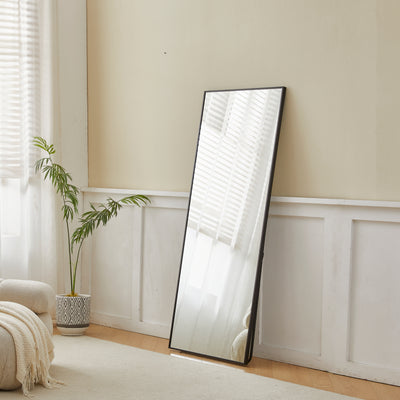 Close-up of the black frame on the Sorelle Rectangular Full Length Standing Mirror
