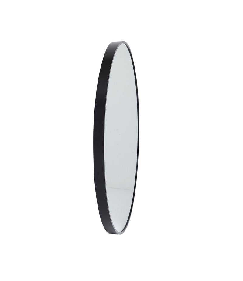 Close-up of the frame of the Stella Round Metal Framed Wall Mirror in black.